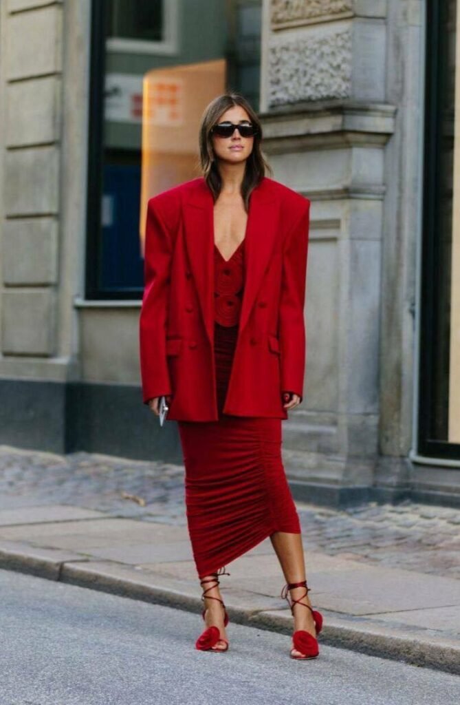 A red outfit symbolizes passion and confidence
