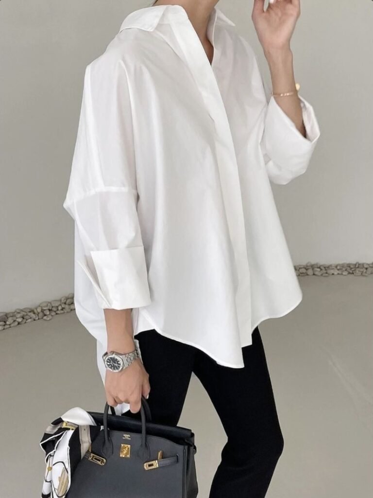 Woman in a white oversized shirt